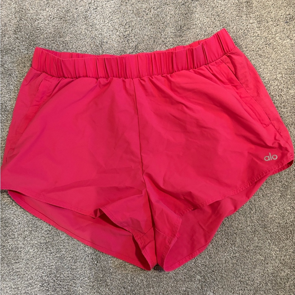 Pink Alo Playmaker Dolphin shorts, size medium